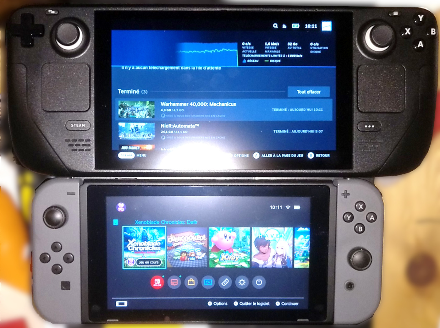 Steam Deck side by side with a Nintendo Switch
